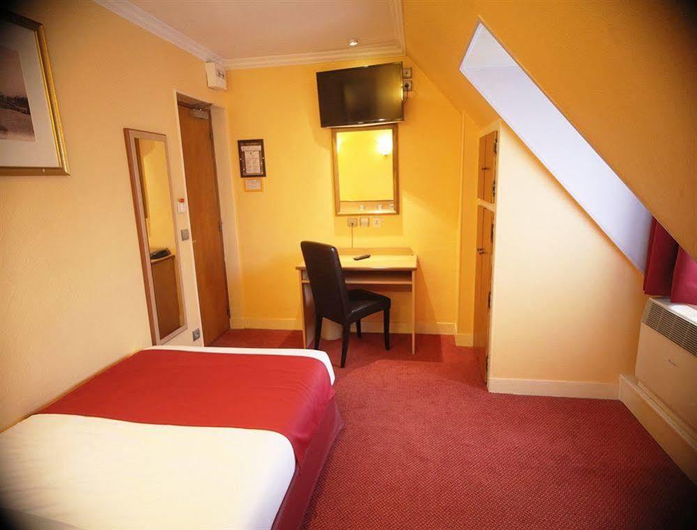 Grand Hotel Amelot Paris Bagian luar foto